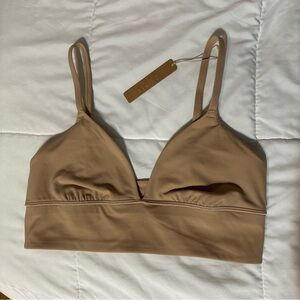 SKIMS Tan Wireless Bralette with adjustable straps